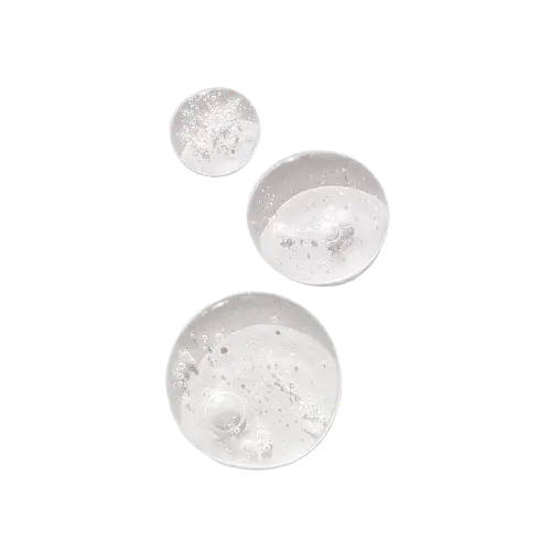 Three silver glittery sphere earrings on a white background